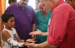 An NHS doctor assesses an injured boy in Gaza. Picture: Medical Aid for Palestinians