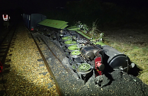 Derailed train after the collision, shown on its side