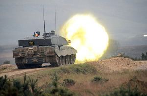 A white-hot round is fired from a Challenger 2 tank's gun [Picture: Sergeant Russ Nolan, Crown copyright]