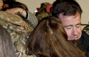 RAF airmen and women of 12(B) Squadron are greeted by their loved ones at RAF Lossiemouth following a four-month deployment to Afghanistan