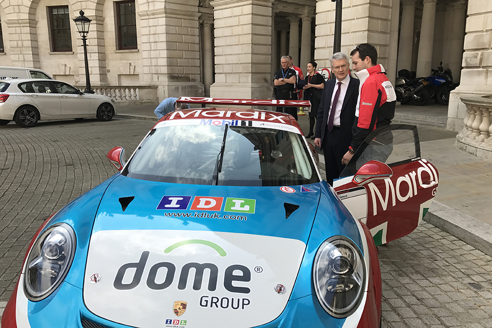 Roads Minister Andrew Jones with  Porsche driver Tom Sharp.