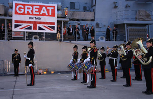 The Band of the Royal Logistic Corps plays by HMS Argyll at Hamburg docks