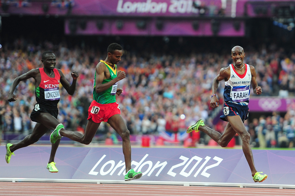 Mo Farah laimi vyrų 5000 metrų bėgimo finalą. Nuotrauka: Adam Davy/PAWire.