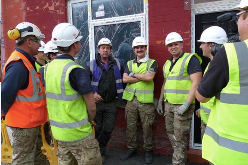 Members of the Corps of Royal Engineers with Nick Knowles