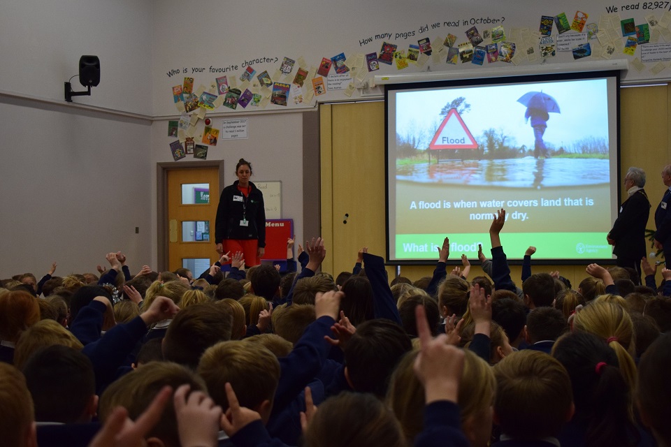 Image shows Taryn at the school assembly