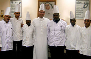 Mohammed Abdul Latif Jameel with trainee cooks from Bab Risq Jameel