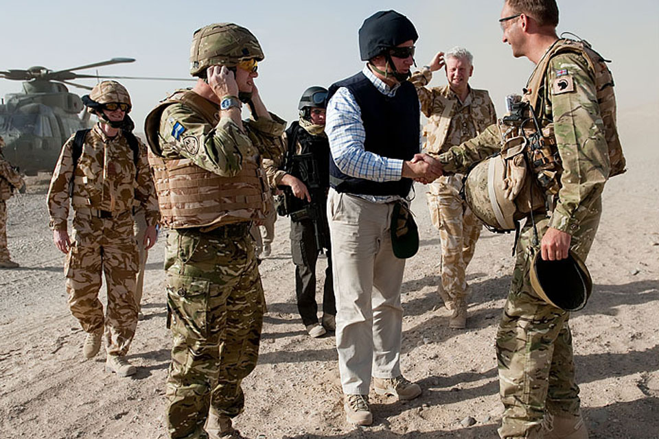Armed Forces Minister Nick Harvey meets British troops in Helmand province, southern Afghanistan