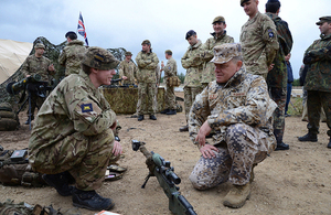 The Latvian Chief of Defence meeting British soldiers during a NATO training exercise [Picture: John Hall]