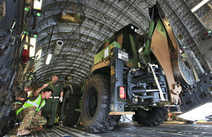 A British C-17 from 99 Squadron assists in the movement of French equipment to Guadeloupe in the Caribbean in support of French helicopter operations. Crown copyright.