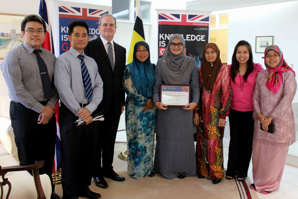 British High Commissioner David Campbell with Siti Nurfateha Abdullah and Brunei Chevening Alumni