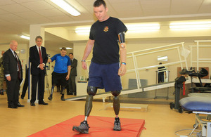 Corporal Matt Webb trying out his new prosthetic legs at Headley Court [Picture: Petty Officer (Photographer) Derek Wade, Crown copyright]