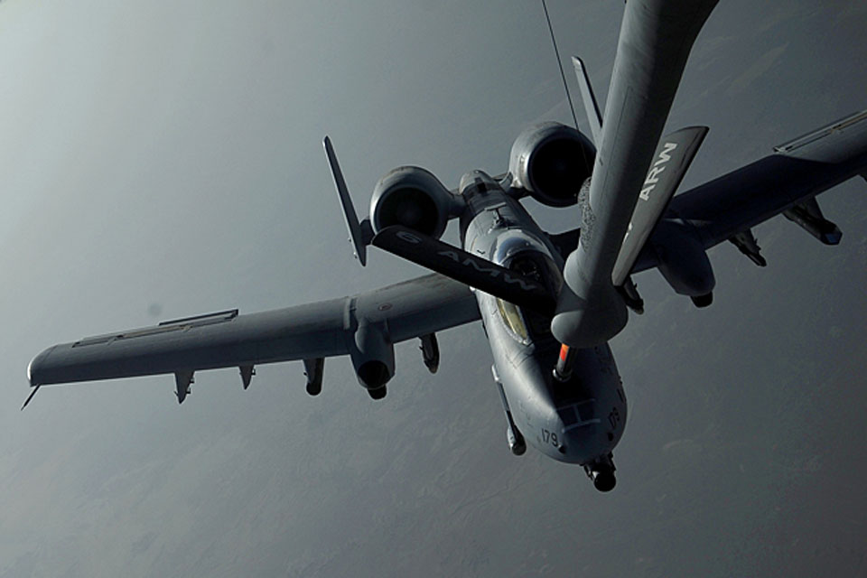 A US Marine Corps A-10 Thunderbolt II 'Warthog' aircraft takes on fuel from a KC-135 Stratotanker aircraft over Afghanistan