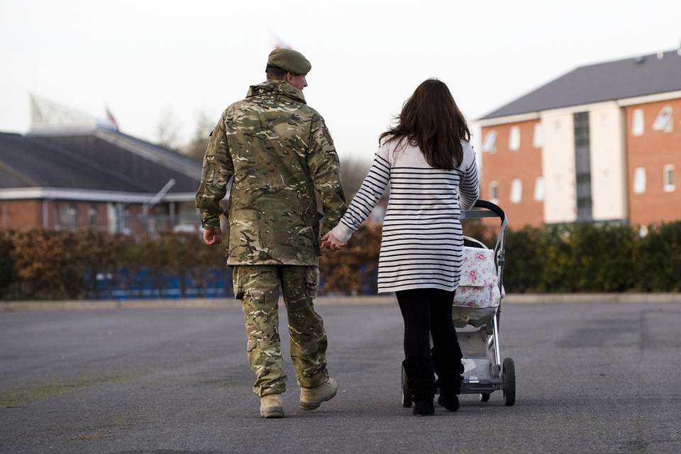 A soldier heads home with his family