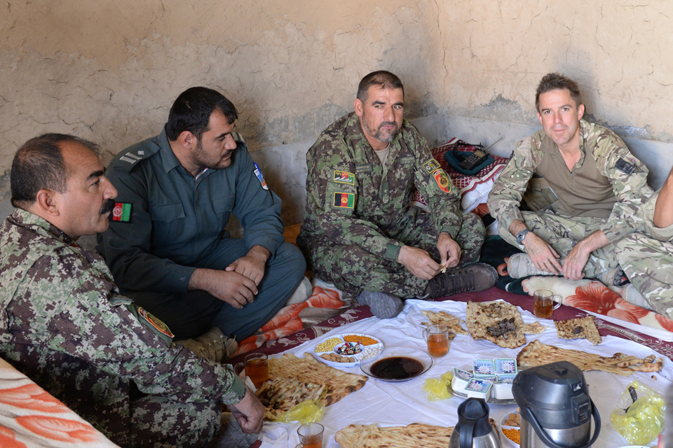 Afghan and British officers dine together