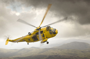 An RAF Search and Rescue Sea King helicopter banks over Snowdonia, North Wales (stock image)