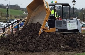 Image shows flood bank repairs taking place in Corbridge in March