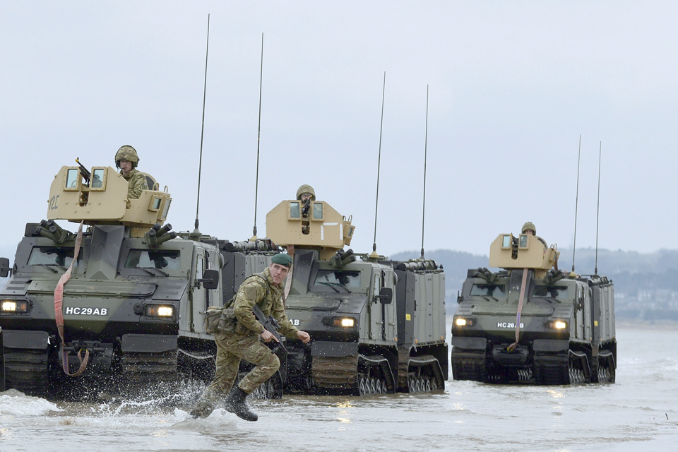 Royal Marines from 42 Commando launch a beach assault