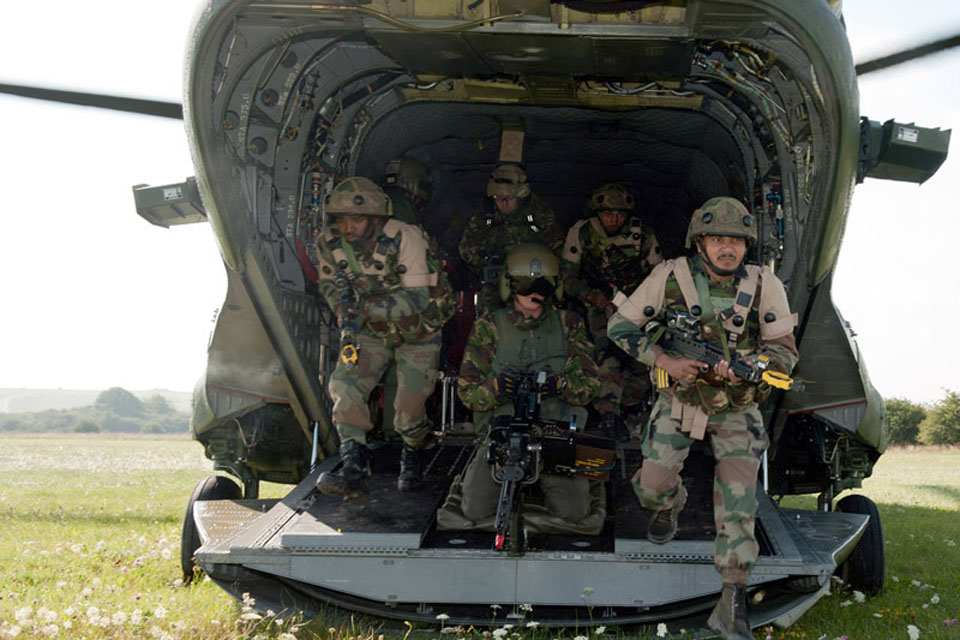 Soldiers from 3rd Battalion The Bihar Regiment disembark from a Chinook helicopter during Exercise Ajeya Warrior on Salisbury Plain