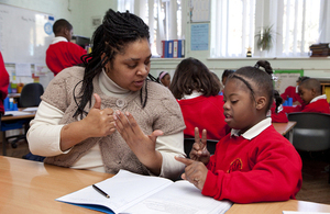 Teacher working with a pupil