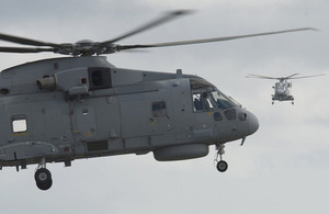 Two new Merlin Mk2 helicopters in flight at Royal Naval Air Station Culdrose [Picture: Andrew Linnett, Crown copyright]