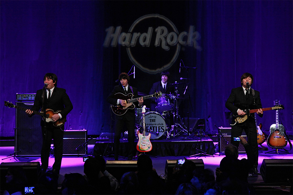 The Cavern Club Beatles perform at the Hard Rock Cafe in New York. Photo by Martin Roe.