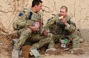Soldiers eating from a ration pack in Afghanistan (library image) [Picture: Sergeant Rupert Frere RLC, Crown copyright]