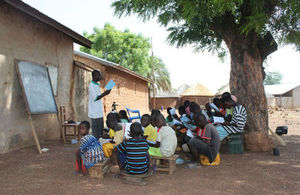 Children being taught in an outdoor classroom in northern Ghana.Tackling tax evasion will enable Ghana to invest revenues into public services such as education.
