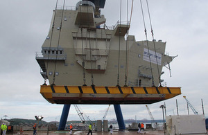 The aft island of HMS Queen Elizabeth about to be lowered into place [Picture: Crown copyright]