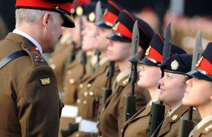 Brigadier Ian Cave talks to Junior Soldier Megan Davies on parade at the Army Foundation College Harrogate