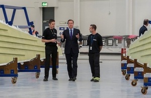 Prime Minister David Cameron visiting Bombardier in Belfast in October 2013.