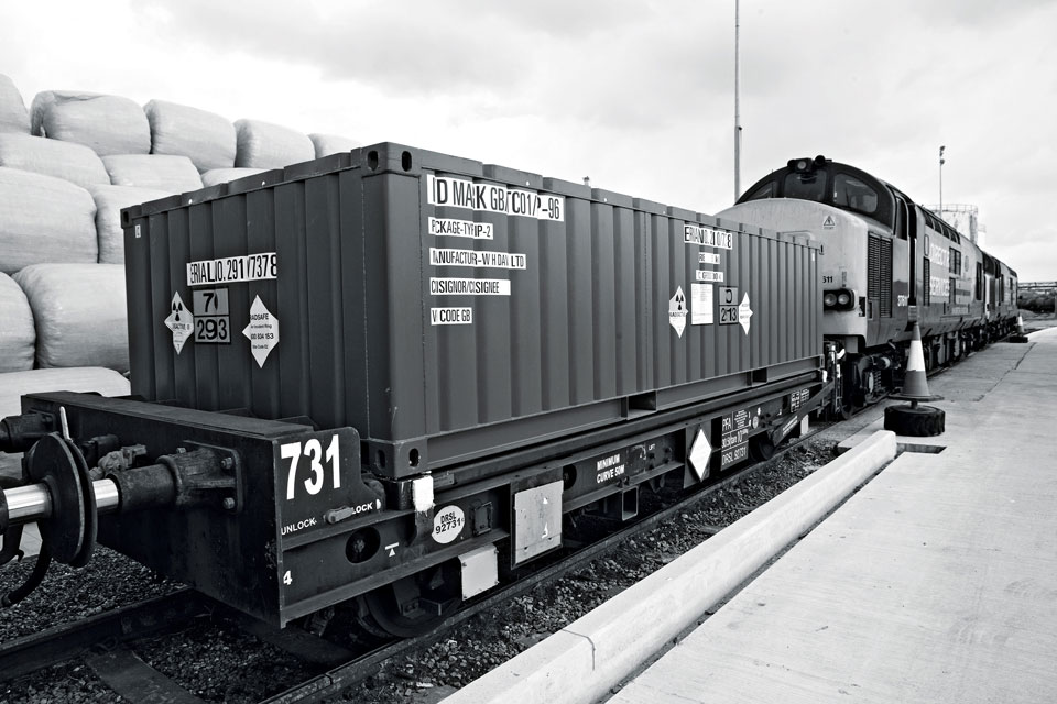 Containers of LLW arriving at the repository by train.