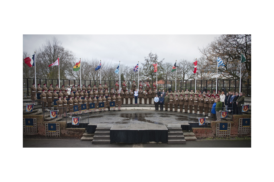 Captain Heather Stanning poses with members of the Corps of Army Music