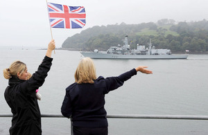 A wave and a cheer for HMS Argyll from loved ones gathered at Devil's Point in Plymouth to see the frigate off on a six-month tour of duty