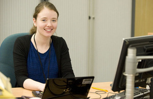 Kelly Dunlea sitting at desk