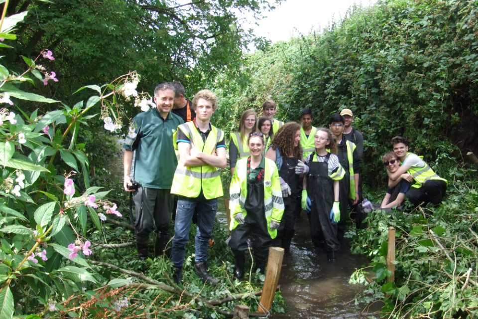 Young people volunteer to improve the Lyme Brook