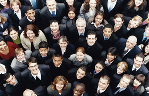 Business people standing in a crowd