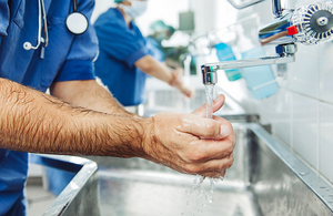 Surgeon washing hands