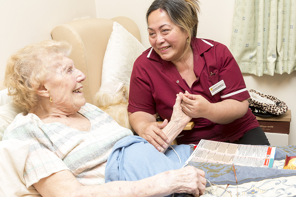 Patient in a care home with a carer