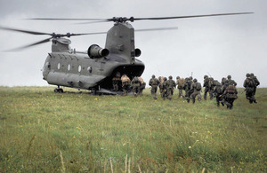 Troops from 1st Battalion The Royal Irish Regiment board a Chinook support helicopter during 16 Air Assault Brigade's final pre-deployment training exercise on Salisbury Plain