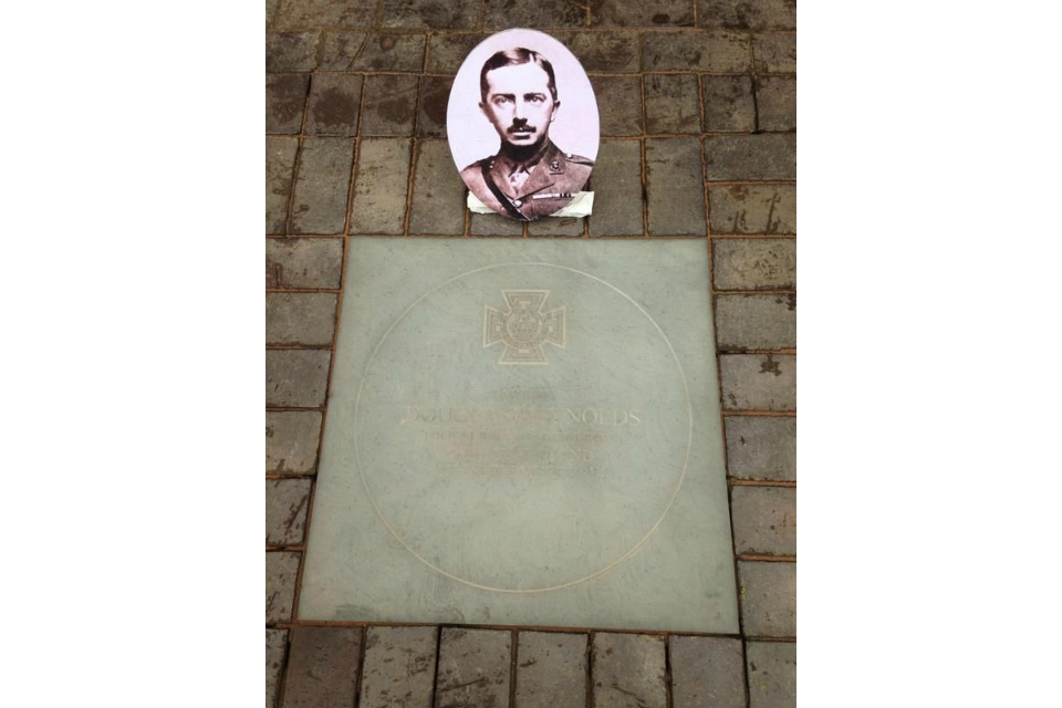 Victoria Cross paving stone in honour of Captain Douglas Reynolds.