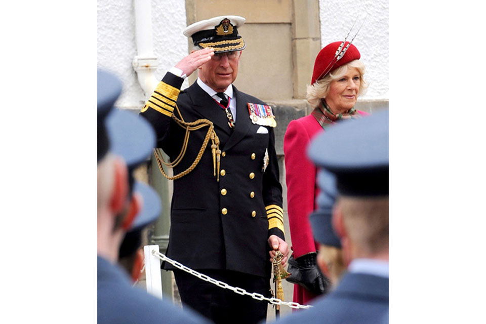 Prince Charles takes the salute from members of the Royal Air Force as they pass by during the Queen's Diamond Jubilee Parade 