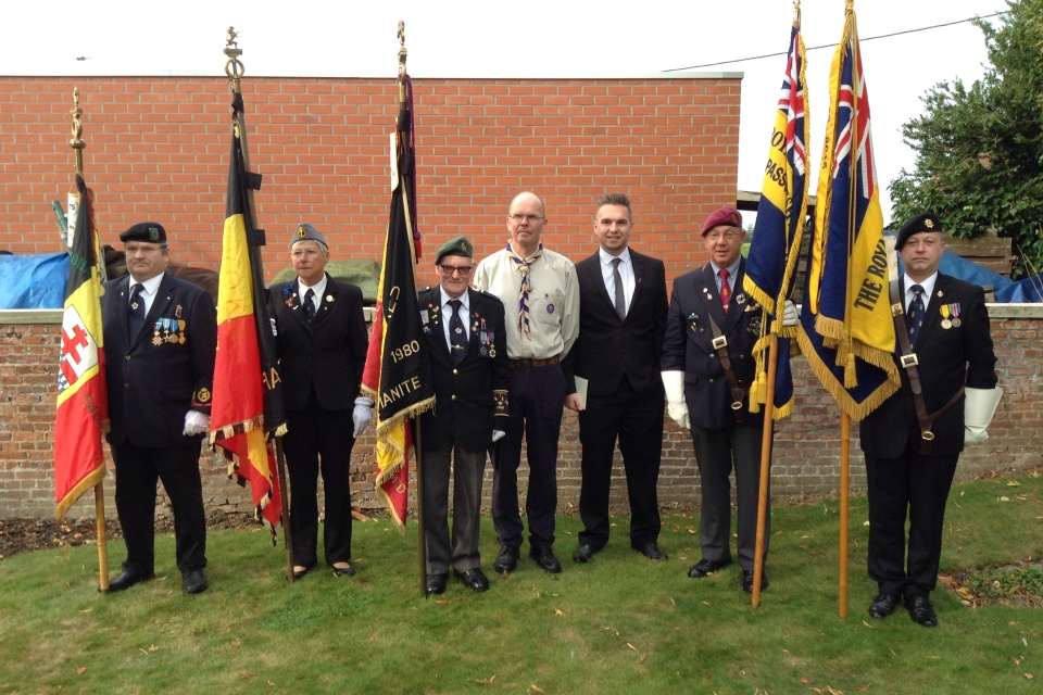 (left to right): CSM Gale’s great grandson Gary Boxall and his son Guy Boxall stand side by side the Belgium flag bearers and two representing the Royal British Legion - Crown Copyright - All rights reserved