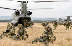 Royal Marines from 42 Commando emerge from RAF Chinook helicopters on the Barry Buddon training area in Scotland [Picture: Petty Officer (Photographer) Sean Clee, Crown copyright]