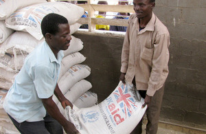 Distributing UK-funded food aid with the World Food Programme in Malawi. Picture: WFP/Greg Barrow