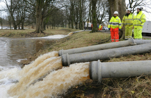 Environment Agency staff overseeing pumping