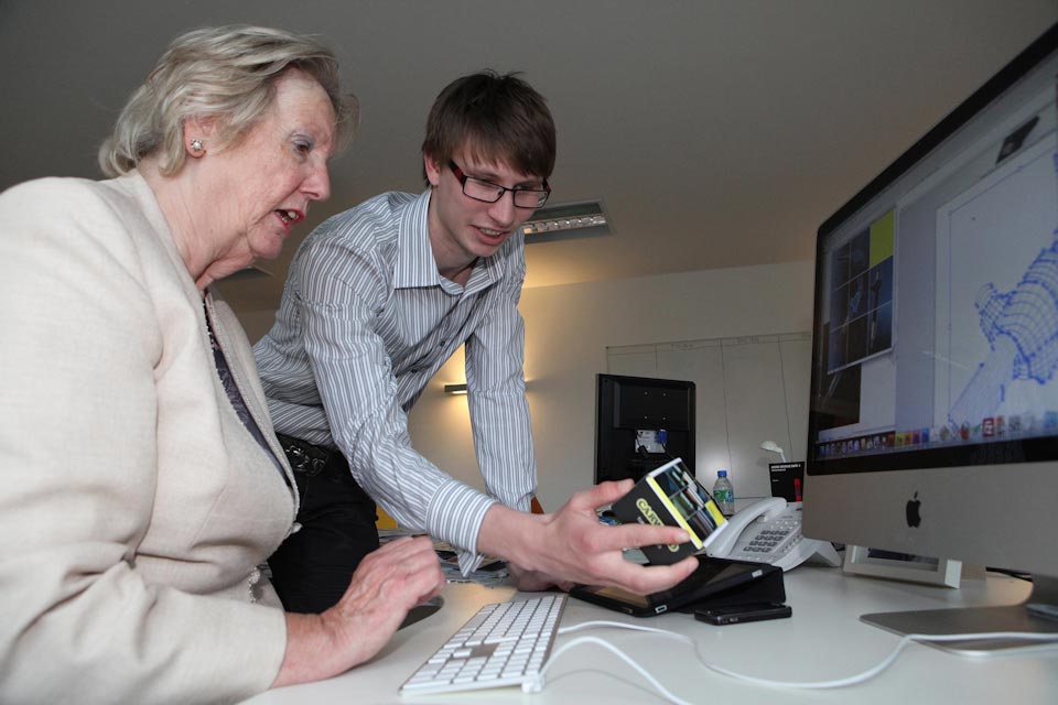 Baroness Hanham in front of a computer