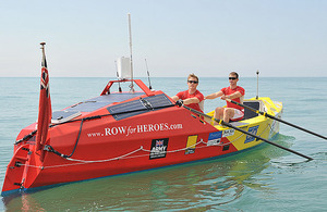 Captains Hamish Reid and Nick Dennison in their ocean-going rowing boat 'Komale'