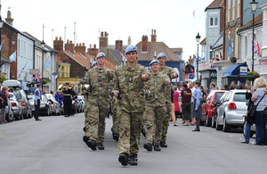 Soldiers from 3 Regiment Army Air Corps march through the town of Aldeburgh