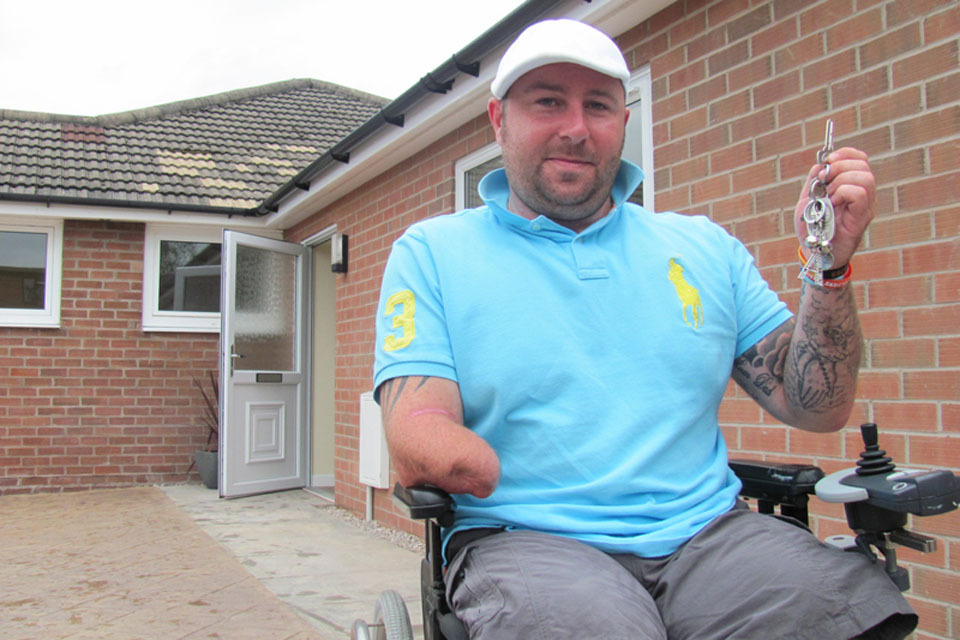 Injured soldier gets key to new home