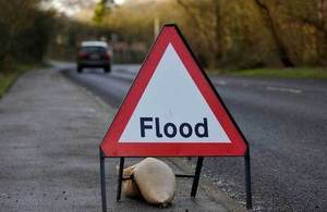 sign on flooded road